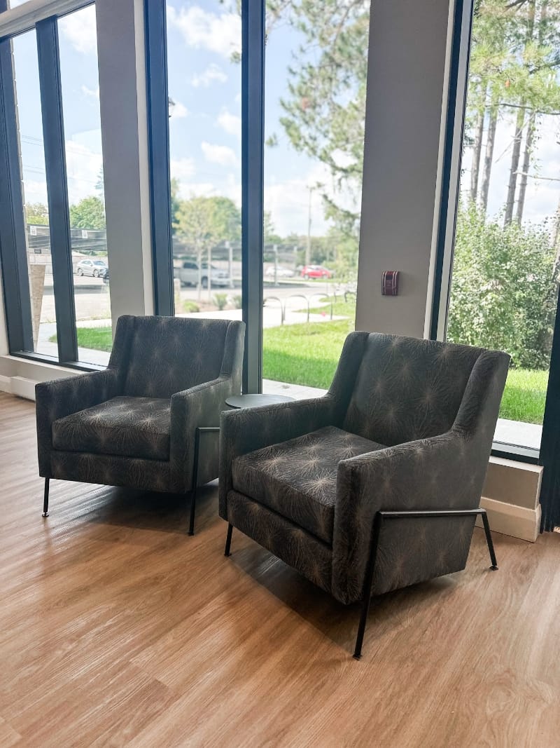 Chairs in lobby of Lanark Lifestyles Luxury Senior Apartments