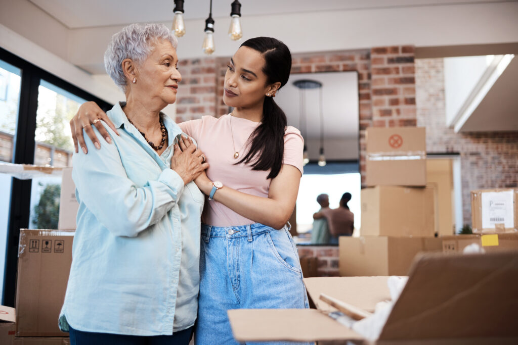 Ill visit you every weekend, Mom. Shot of a senior woman moving house with help from her daughter.